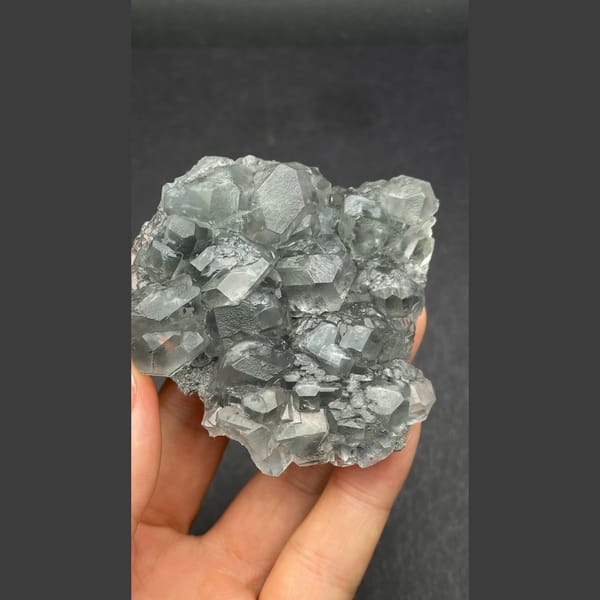 Glassy pale blue fluorite cluster from Fujian — alternate view