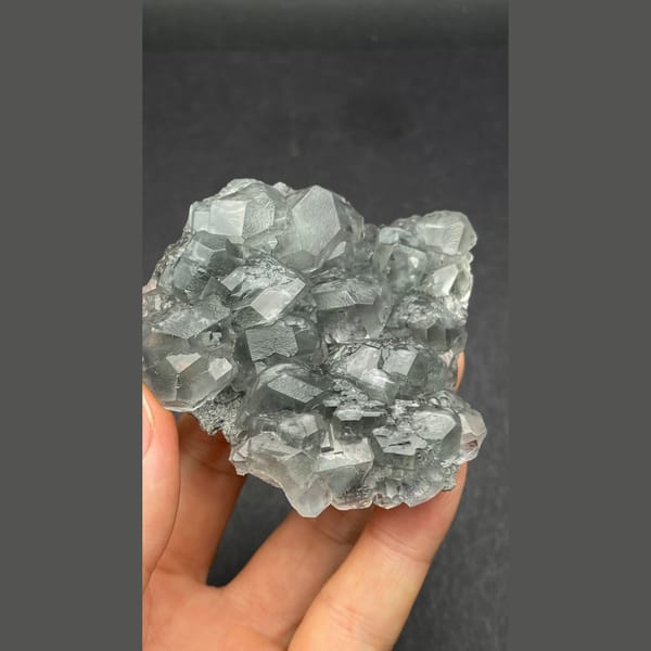 Glassy pale blue fluorite cluster from Fujian — detail view
