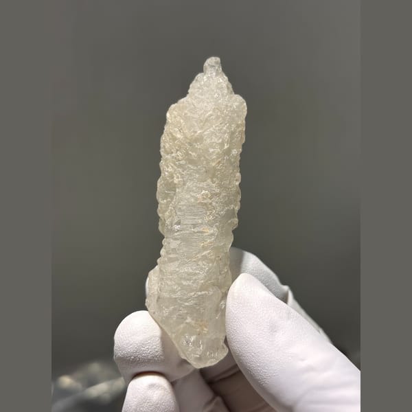Deeply etched frosty quartz crystal from Madagascar — alternate view