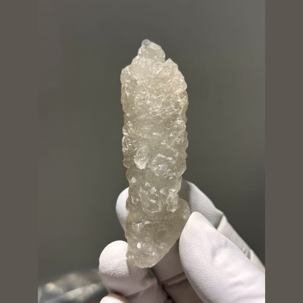 Deeply etched frosty quartz crystal from Madagascar — alternate view