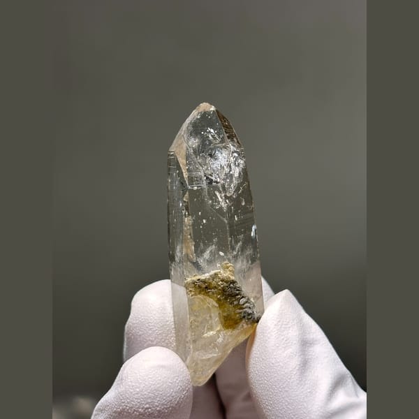 Slender clear quartz point from Xuebaoding — alternate view