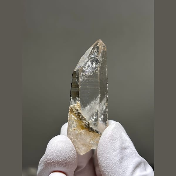 Slender clear quartz point from Xuebaoding — alternate view