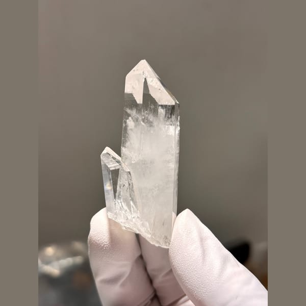 Clear quartz point with side crystal from Xuebaoding — complete view
