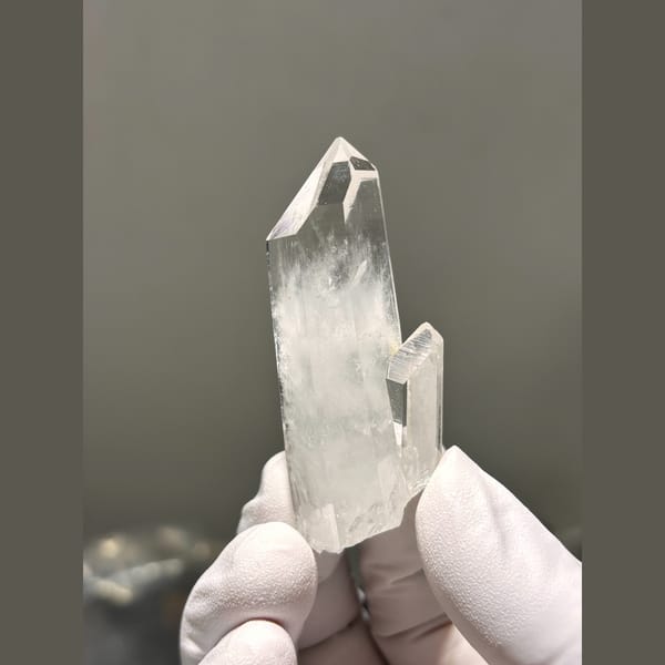 Clear quartz point with side crystal from Xuebaoding — alternate view