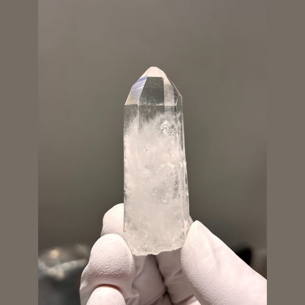 Clear quartz point with side crystal from Xuebaoding — alternate view