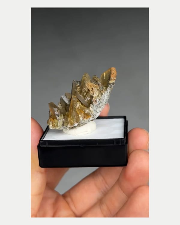 Complete left side view of tea-brown Yunnan barite cluster
