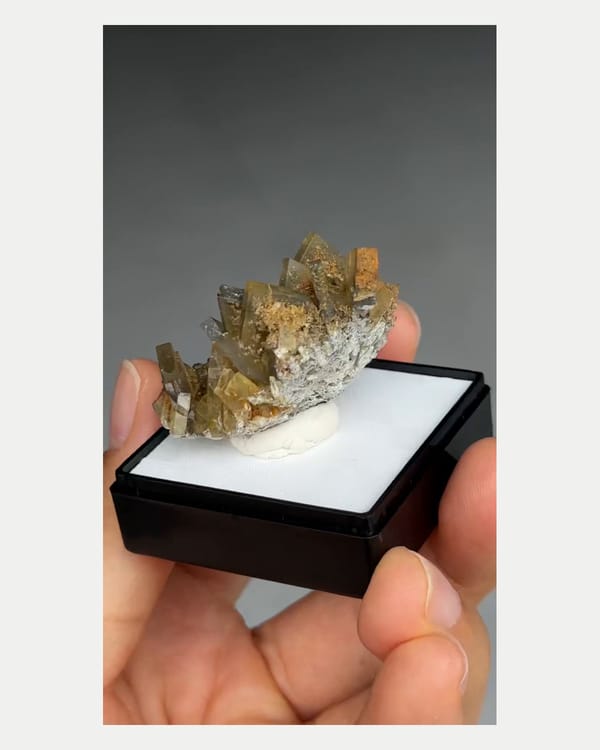 Complete reverse view of compact brown barite crystal cluster