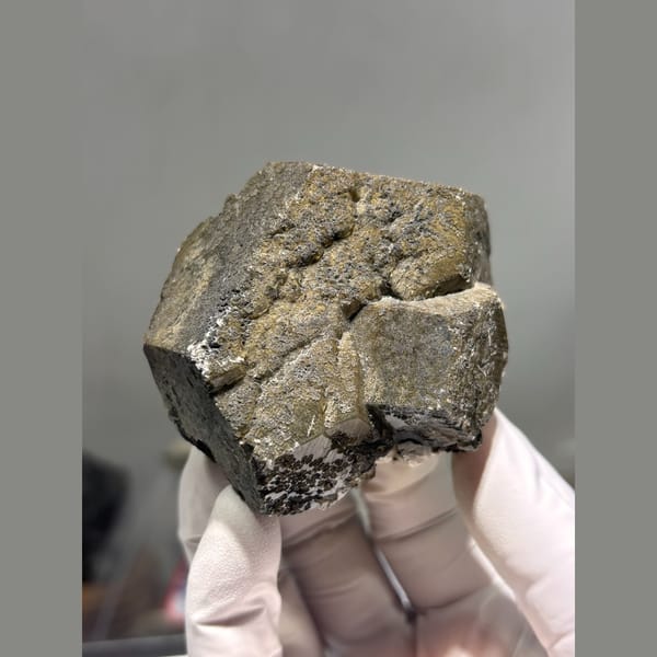 Large blocky dark coated calcite from Fujian — complete view