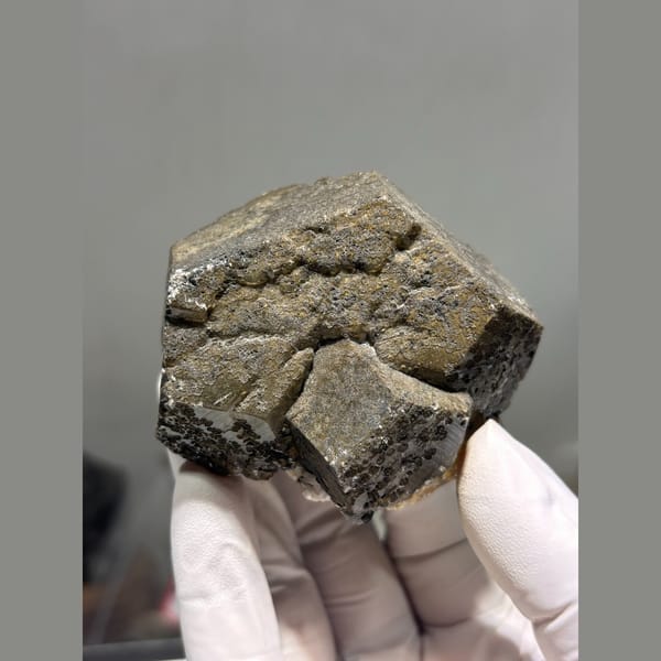 Large blocky dark coated calcite from Fujian — alternate view