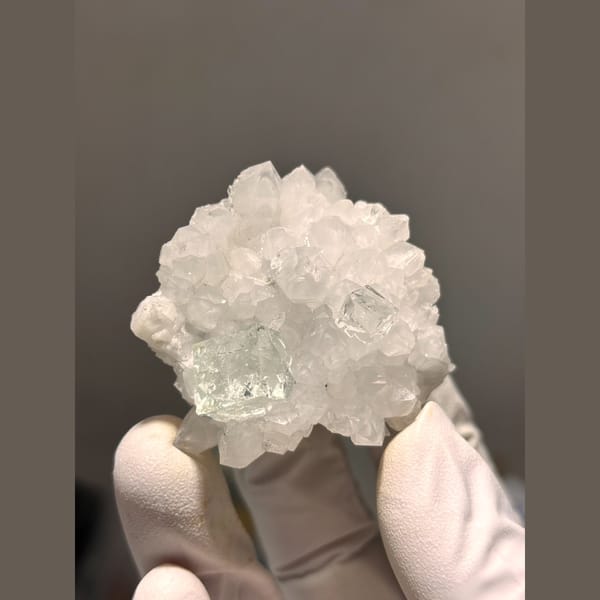 Pale green fluorite on frosty white quartz from Zhejiang — complete view
