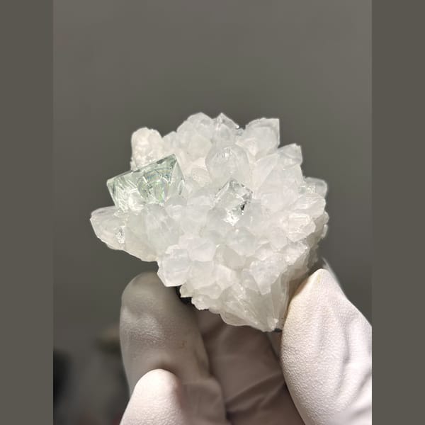 Pale green fluorite on frosty white quartz from Zhejiang — alternate view