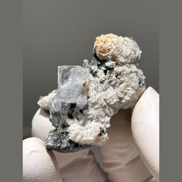 Pale blue fluorite with calcite and galena — detail view