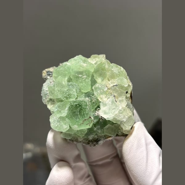 Rounded green fluorite cluster with quartz from Fujian — complete view