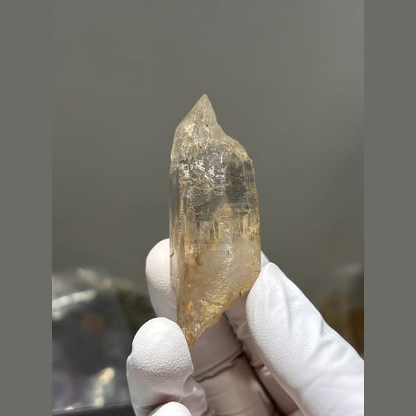 Golden iron stained quartz point from Pakistan — alternate view