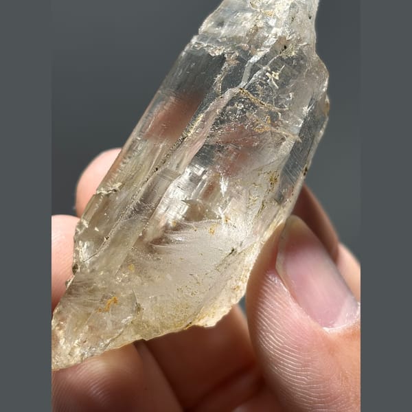 Golden iron stained quartz point from Pakistan — alternate view