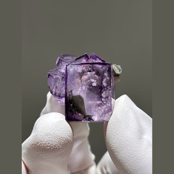 Glassy purple fluorite with dolomite from Yaogangxian — alternate view