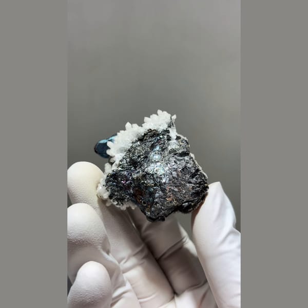 Iridescent sphalerite and pyrite with white quartz from Inner Mongolia — detail view