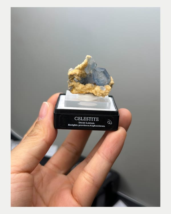 Complete left oblique view of celestite and calcite specimen