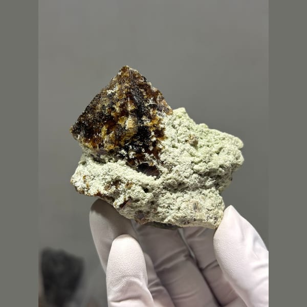 Dark lustrous vesuvianite crystal from Hebei — alternate view