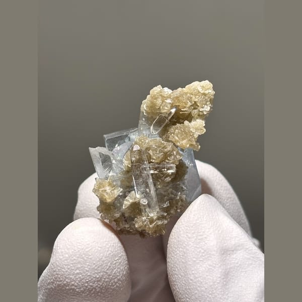 Clear fluorite cube with mica from Yaogangxian — alternate view
