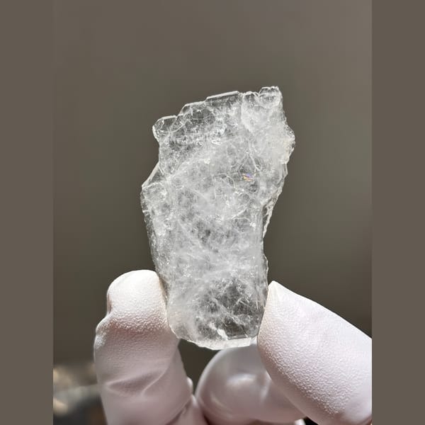 Thin flat clear quartz blade from Xuebaoding — alternate view
