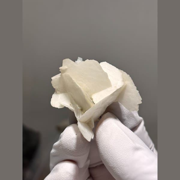 Intersecting white bladed calcite from Hunan — complete view