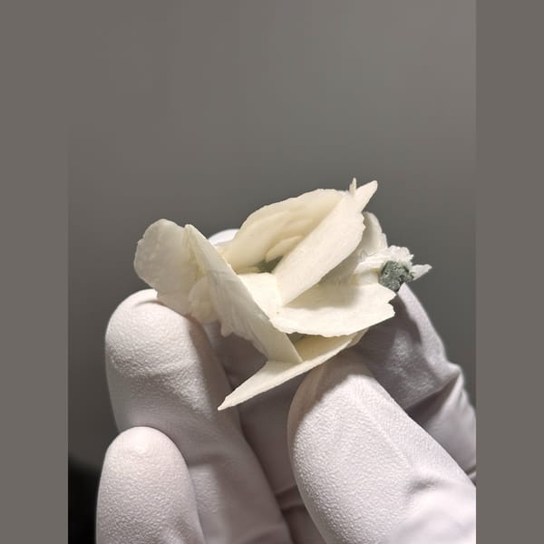 Intersecting white bladed calcite from Hunan — alternate view