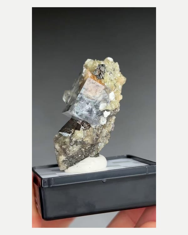 Complete side view of the exact fluorite with mica and arsenopyrite specimen