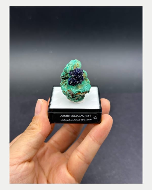 Complete front view of deep blue Liufengshan azurite with malachite