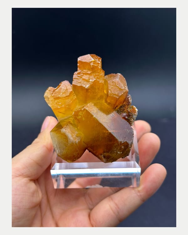 Complete front view of golden-yellow Fujian calcite crystal cluster