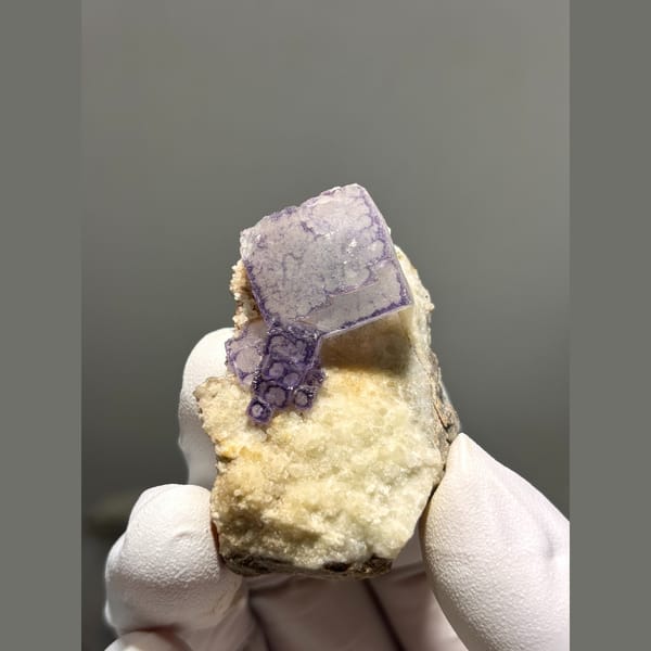 Clear fluorite cube with purple edges from Guizhou — alternate view