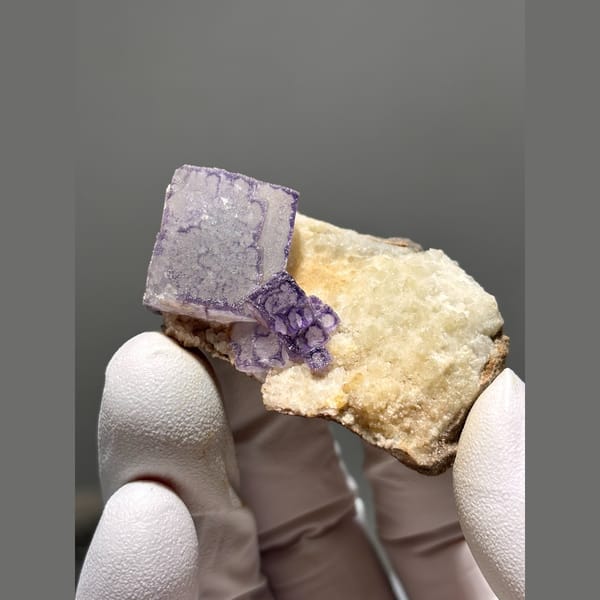 Clear fluorite cube with purple edges from Guizhou — alternate view