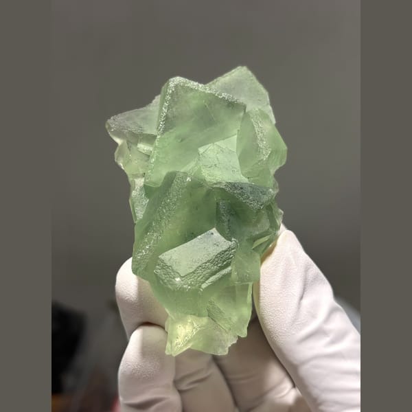Translucent pale green fluorite cluster from Fujian — alternate view
