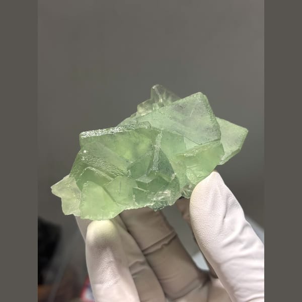Translucent pale green fluorite cluster from Fujian — alternate view