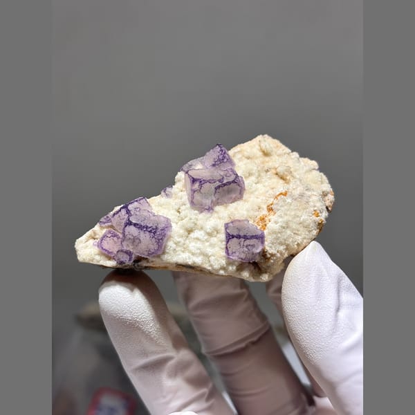 Purple edged fluorite cubes on white matrix from Guizhou — complete view