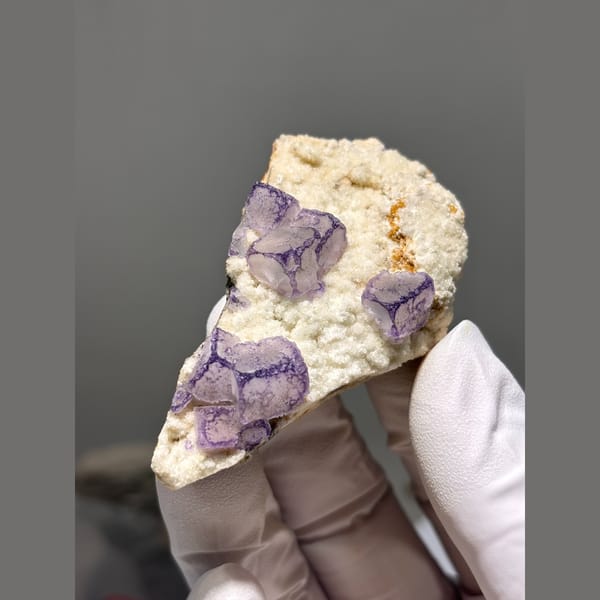 Purple edged fluorite cubes on white matrix from Guizhou — alternate view