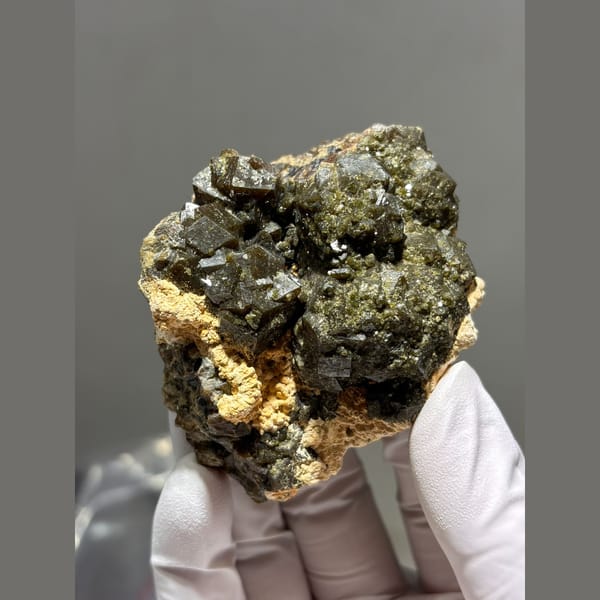 Olive green garnet cluster from Inner Mongolia — complete view