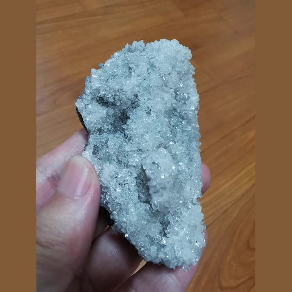 Sparkling apophyllite cluster with quartz — detail view