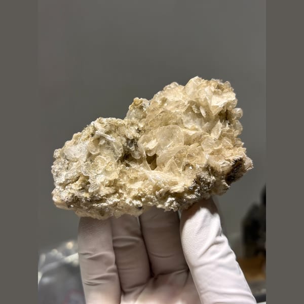 Bladed tan calcite with quartz and mica from Xuebaoding — complete view