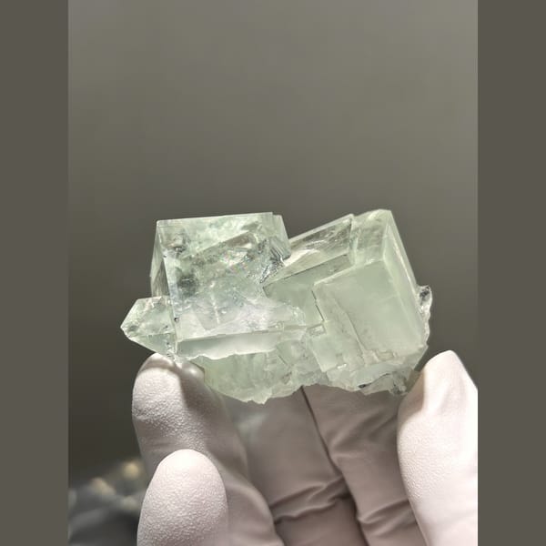Glassy green fluorite cubes from Zhejiang — alternate view
