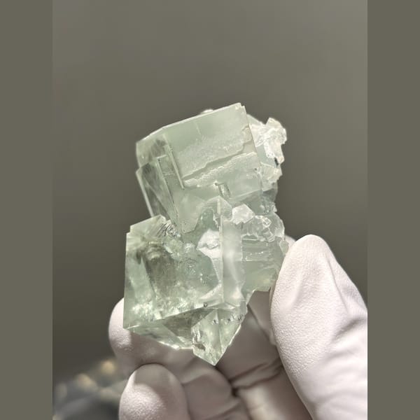 Glassy green fluorite cubes from Zhejiang — alternate view