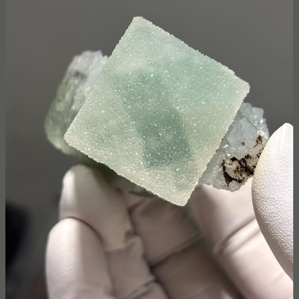 Sugar-textured fluorite cluster — detail view