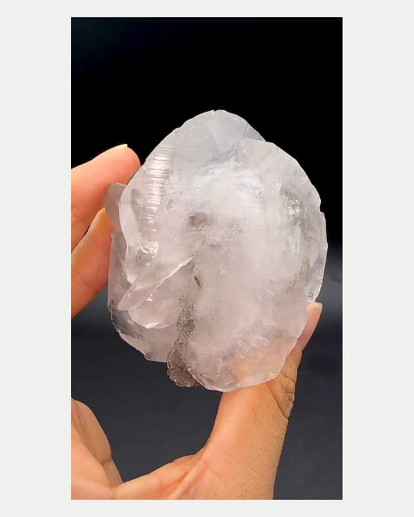 Complete right oblique view of calcite with pyrite and fluorite