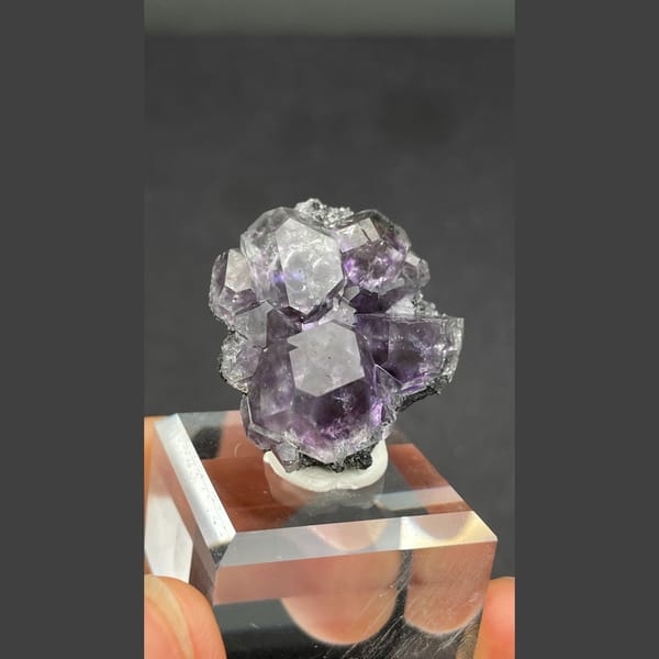 Glassy purple fluorite cube cluster from Fujian — complete view