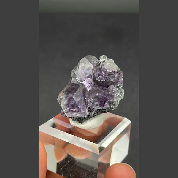 Glassy purple fluorite cube cluster from Fujian — detail view