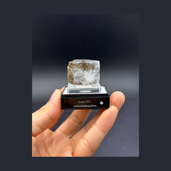 Four-Sided Jinhua Calcite Crystal with Internal Veils — full specimen view 1 of 3