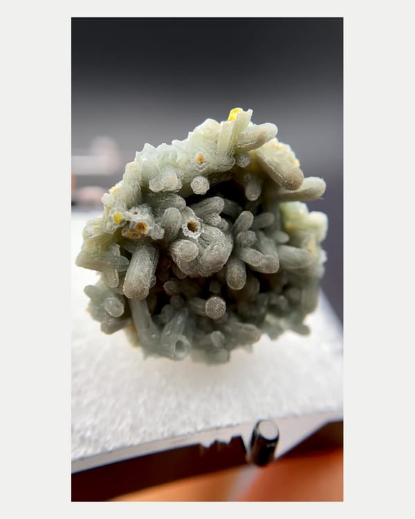 Complete front view of pale blue-green plumbogummite cluster