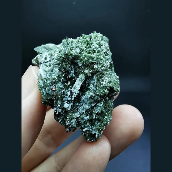 Green epidote cluster from Shijiangshan — complete view