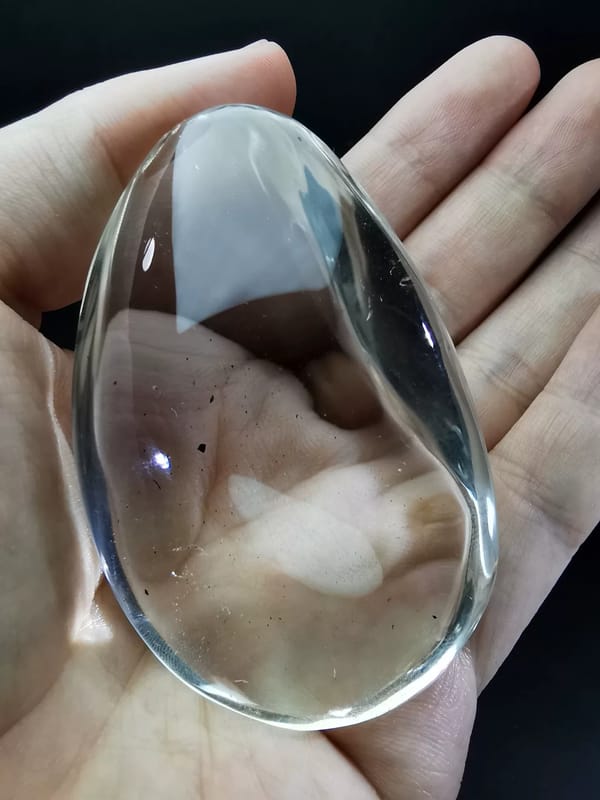 Complete reverse view of the transparent clear quartz palm stone