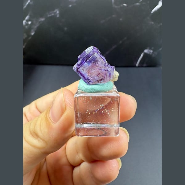 Small purple-edged fluorite with dolomite from Yaogangxian — alternate view
